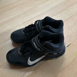 Nike boy cleats, worn once. Cleats come with free glove.